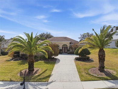 This beautiful 3 bedroom, 3 bath room, 3-car garage home in on Lake Jovita Golf and Country Club in Florida - for sale on GolfHomes.com, golf home, golf lot