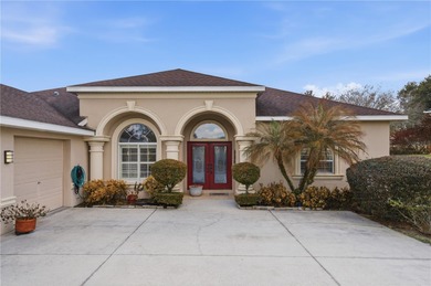 This beautiful 3 bedroom, 3 bath room, 3-car garage home in on Lake Jovita Golf and Country Club in Florida - for sale on GolfHomes.com, golf home, golf lot