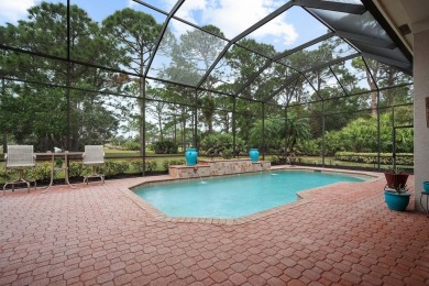 Discover luxury living in this beautifully updated pool home in on PGA Golf Club in PGA Village in Florida - for sale on GolfHomes.com, golf home, golf lot