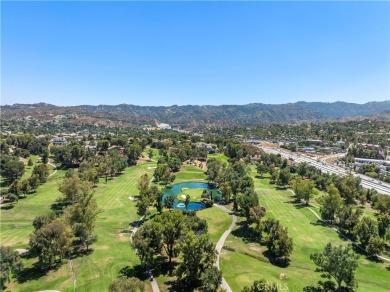 The immaculate end-unit is the largest model at the Valencia on Vista Valencia Golf Course in California - for sale on GolfHomes.com, golf home, golf lot