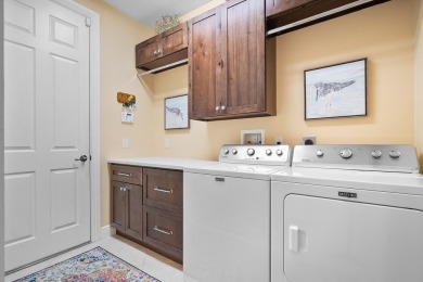 Discover luxury living in this beautifully updated pool home in on PGA Golf Club in PGA Village in Florida - for sale on GolfHomes.com, golf home, golf lot