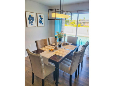 Nicely updated 3 Bedroom Home with pool, A. C. Kitchen with wood on Rotonda Golf and Country Club The Hills Course in Florida - for sale on GolfHomes.com, golf home, golf lot