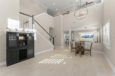 Discover peace and tranquility in this stunning premium on Eagle Creek Golf Club in Florida - for sale on GolfHomes.com, golf home, golf lot