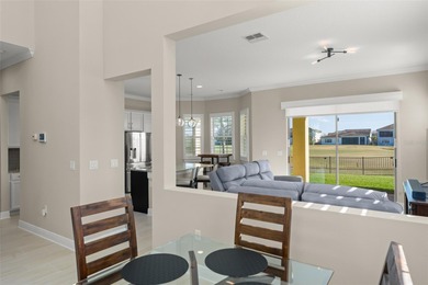 Discover peace and tranquility in this stunning premium on Eagle Creek Golf Club in Florida - for sale on GolfHomes.com, golf home, golf lot