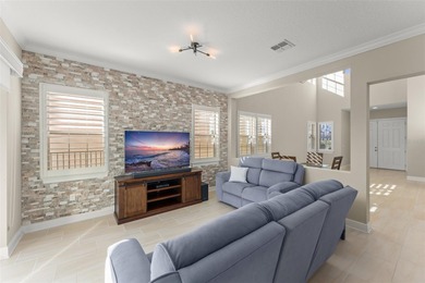 Discover peace and tranquility in this stunning premium on Eagle Creek Golf Club in Florida - for sale on GolfHomes.com, golf home, golf lot