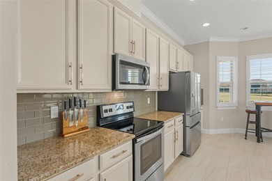 Discover peace and tranquility in this stunning premium on Eagle Creek Golf Club in Florida - for sale on GolfHomes.com, golf home, golf lot