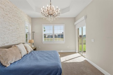 Discover peace and tranquility in this stunning premium on Eagle Creek Golf Club in Florida - for sale on GolfHomes.com, golf home, golf lot