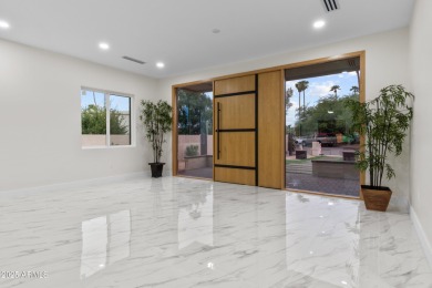 Experience luxury living in this stunning contemporary residence on The Orange Tree Golf Resort in Arizona - for sale on GolfHomes.com, golf home, golf lot