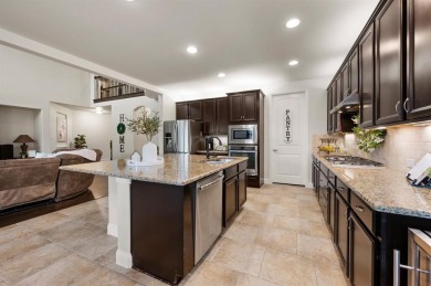 Tucked inside a quiet gated community just steps from Lake on The Tribute At the Colony in Texas - for sale on GolfHomes.com, golf home, golf lot