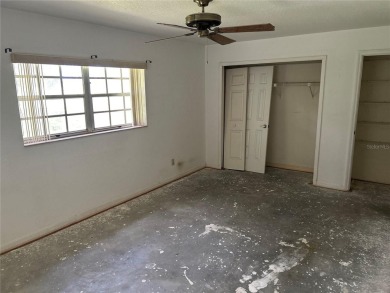 FANTASTIC INVESTMENT OPPORTUNITY TO PICK UP THIS FIXER UPPER IN on Seven Springs Golf and Country Club in Florida - for sale on GolfHomes.com, golf home, golf lot