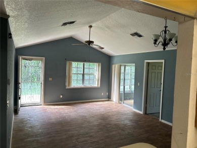 FANTASTIC INVESTMENT OPPORTUNITY TO PICK UP THIS FIXER UPPER IN on Seven Springs Golf and Country Club in Florida - for sale on GolfHomes.com, golf home, golf lot