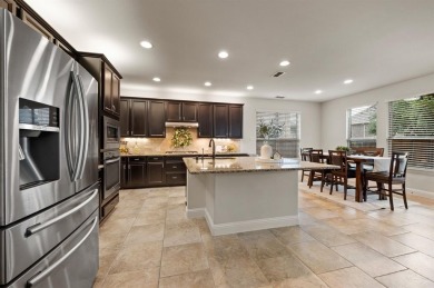 Tucked inside a quiet gated community just steps from Lake on The Tribute At the Colony in Texas - for sale on GolfHomes.com, golf home, golf lot