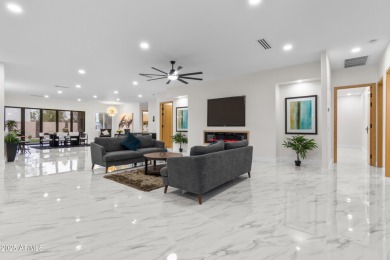 Experience luxury living in this stunning contemporary residence on The Orange Tree Golf Resort in Arizona - for sale on GolfHomes.com, golf home, golf lot