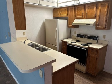 FANTASTIC INVESTMENT OPPORTUNITY TO PICK UP THIS FIXER UPPER IN on Seven Springs Golf and Country Club in Florida - for sale on GolfHomes.com, golf home, golf lot