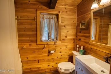 Fully Turnkey FURNISHED! This LOG CABIN, with rec. center on Pinetop Lakes Golf and Country Club in Arizona - for sale on GolfHomes.com, golf home, golf lot