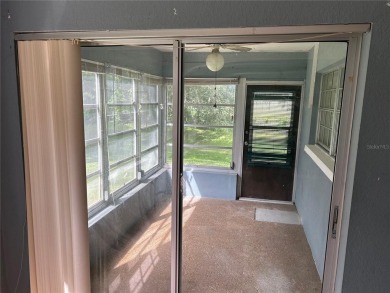 FANTASTIC INVESTMENT OPPORTUNITY TO PICK UP THIS FIXER UPPER IN on Seven Springs Golf and Country Club in Florida - for sale on GolfHomes.com, golf home, golf lot