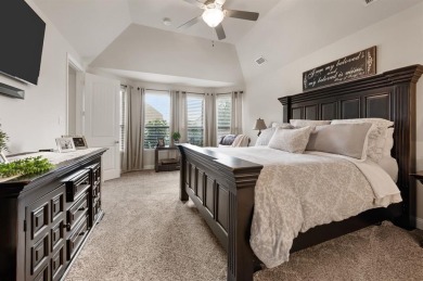 Tucked inside a quiet gated community just steps from Lake on The Tribute At the Colony in Texas - for sale on GolfHomes.com, golf home, golf lot