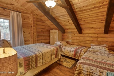 Fully Turnkey FURNISHED! This LOG CABIN, with rec. center on Pinetop Lakes Golf and Country Club in Arizona - for sale on GolfHomes.com, golf home, golf lot