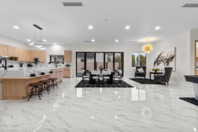 Experience luxury living in this stunning contemporary residence on The Orange Tree Golf Resort in Arizona - for sale on GolfHomes.com, golf home, golf lot