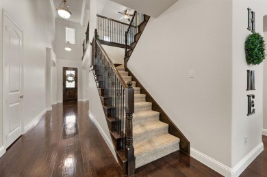 Tucked inside a quiet gated community just steps from Lake on The Tribute At the Colony in Texas - for sale on GolfHomes.com, golf home, golf lot