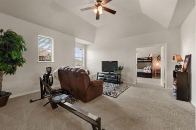 Tucked inside a quiet gated community just steps from Lake on The Tribute At the Colony in Texas - for sale on GolfHomes.com, golf home, golf lot