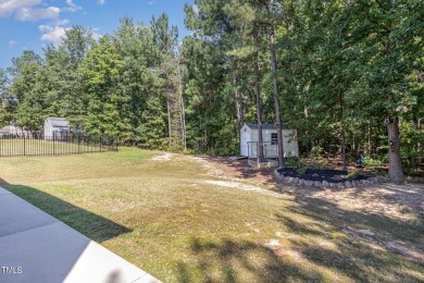 Welcome to this stunning home nestled in a picturesque wooded on Olde Liberty Golf and Country Club in North Carolina - for sale on GolfHomes.com, golf home, golf lot