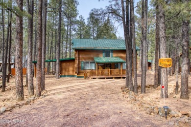 Fully Turnkey FURNISHED! This LOG CABIN, with rec. center on Pinetop Lakes Golf and Country Club in Arizona - for sale on GolfHomes.com, golf home, golf lot