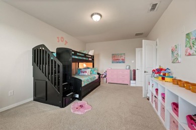 Tucked inside a quiet gated community just steps from Lake on The Tribute At the Colony in Texas - for sale on GolfHomes.com, golf home, golf lot