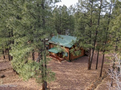 Fully Turnkey FURNISHED! This LOG CABIN, with rec. center on Pinetop Lakes Golf and Country Club in Arizona - for sale on GolfHomes.com, golf home, golf lot