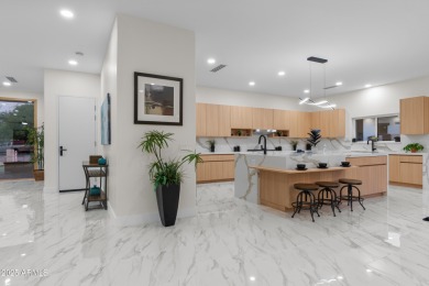 Experience luxury living in this stunning contemporary residence on The Orange Tree Golf Resort in Arizona - for sale on GolfHomes.com, golf home, golf lot