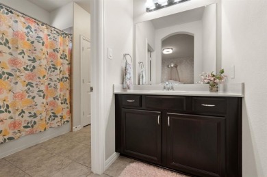 Tucked inside a quiet gated community just steps from Lake on The Tribute At the Colony in Texas - for sale on GolfHomes.com, golf home, golf lot