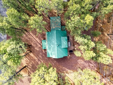 Fully Turnkey FURNISHED! This LOG CABIN, with rec. center on Pinetop Lakes Golf and Country Club in Arizona - for sale on GolfHomes.com, golf home, golf lot