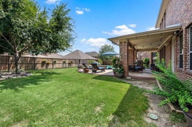 Tucked inside a quiet gated community just steps from Lake on The Tribute At the Colony in Texas - for sale on GolfHomes.com, golf home, golf lot