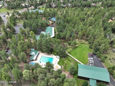 Fully Turnkey FURNISHED! This LOG CABIN, with rec. center on Pinetop Lakes Golf and Country Club in Arizona - for sale on GolfHomes.com, golf home, golf lot