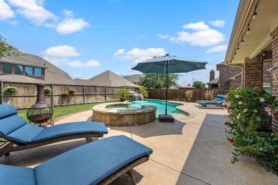Tucked inside a quiet gated community just steps from Lake on The Tribute At the Colony in Texas - for sale on GolfHomes.com, golf home, golf lot