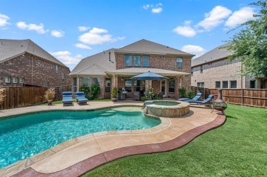 Tucked inside a quiet gated community just steps from Lake on The Tribute At the Colony in Texas - for sale on GolfHomes.com, golf home, golf lot