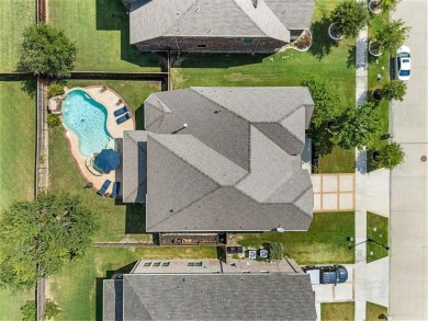Tucked inside a quiet gated community just steps from Lake on The Tribute At the Colony in Texas - for sale on GolfHomes.com, golf home, golf lot