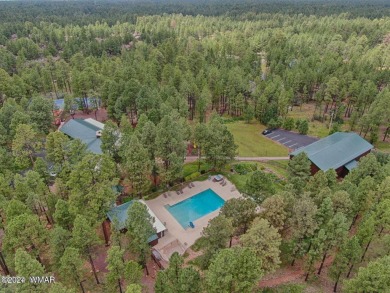 Fully Turnkey FURNISHED! This LOG CABIN, with rec. center on Pinetop Lakes Golf and Country Club in Arizona - for sale on GolfHomes.com, golf home, golf lot