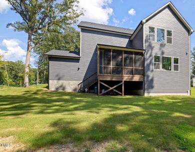 Newly painted and exquisitely designed home nestled in a small on Occoneechee Golf Club in North Carolina - for sale on GolfHomes.com, golf home, golf lot