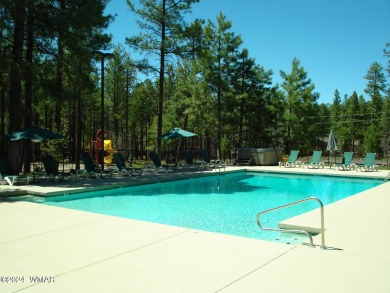Fully Turnkey FURNISHED! This LOG CABIN, with rec. center on Pinetop Lakes Golf and Country Club in Arizona - for sale on GolfHomes.com, golf home, golf lot