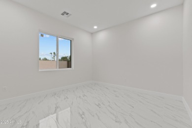 Experience luxury living in this stunning contemporary residence on The Orange Tree Golf Resort in Arizona - for sale on GolfHomes.com, golf home, golf lot