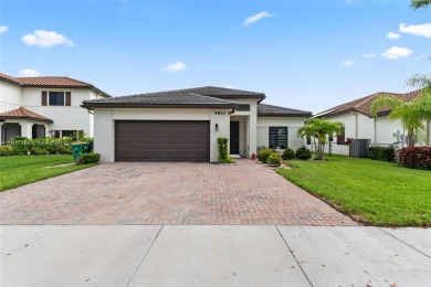 Welcome to your new home in Maple Ridge, Ave Maria! This on Panther Run Golf Club in Florida - for sale on GolfHomes.com, golf home, golf lot