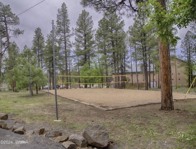 Fully Turnkey FURNISHED! This LOG CABIN, with rec. center on Pinetop Lakes Golf and Country Club in Arizona - for sale on GolfHomes.com, golf home, golf lot