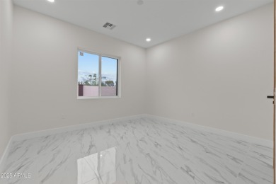 Experience luxury living in this stunning contemporary residence on The Orange Tree Golf Resort in Arizona - for sale on GolfHomes.com, golf home, golf lot