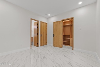 Experience luxury living in this stunning contemporary residence on The Orange Tree Golf Resort in Arizona - for sale on GolfHomes.com, golf home, golf lot