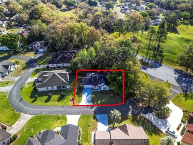THIS 3 BEDROOM 2 BATH CBS HOME IS ON A CORNER LOT. HAS LARGER on Royal Oaks Golf Club in Florida - for sale on GolfHomes.com, golf home, golf lot