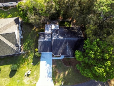 THIS 3 BEDROOM 2 BATH CBS HOME IS ON A CORNER LOT. HAS LARGER on Royal Oaks Golf Club in Florida - for sale on GolfHomes.com, golf home, golf lot
