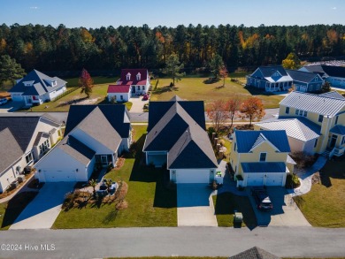 Welcome to 4067 Reunion Pointe Lane, a charming single-family on Carolina Colours Golf Club in North Carolina - for sale on GolfHomes.com, golf home, golf lot