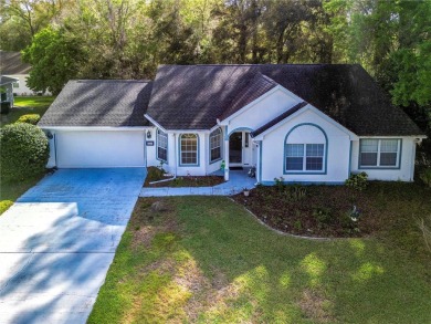 THIS 3 BEDROOM 2 BATH CBS HOME IS ON A CORNER LOT. HAS LARGER on Royal Oaks Golf Club in Florida - for sale on GolfHomes.com, golf home, golf lot