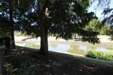 POND VIEWS! Discover the ultimate in canal-side living with this on Brookhaven Country Club - Golf Course in Texas - for sale on GolfHomes.com, golf home, golf lot